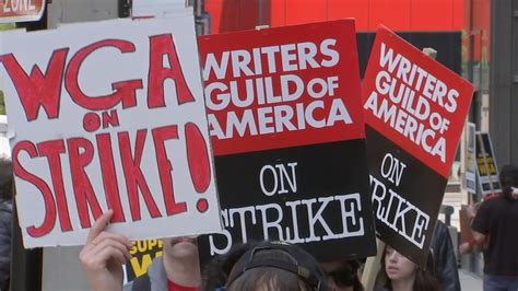 Television writers strike in front of NBC Tower in the Loop